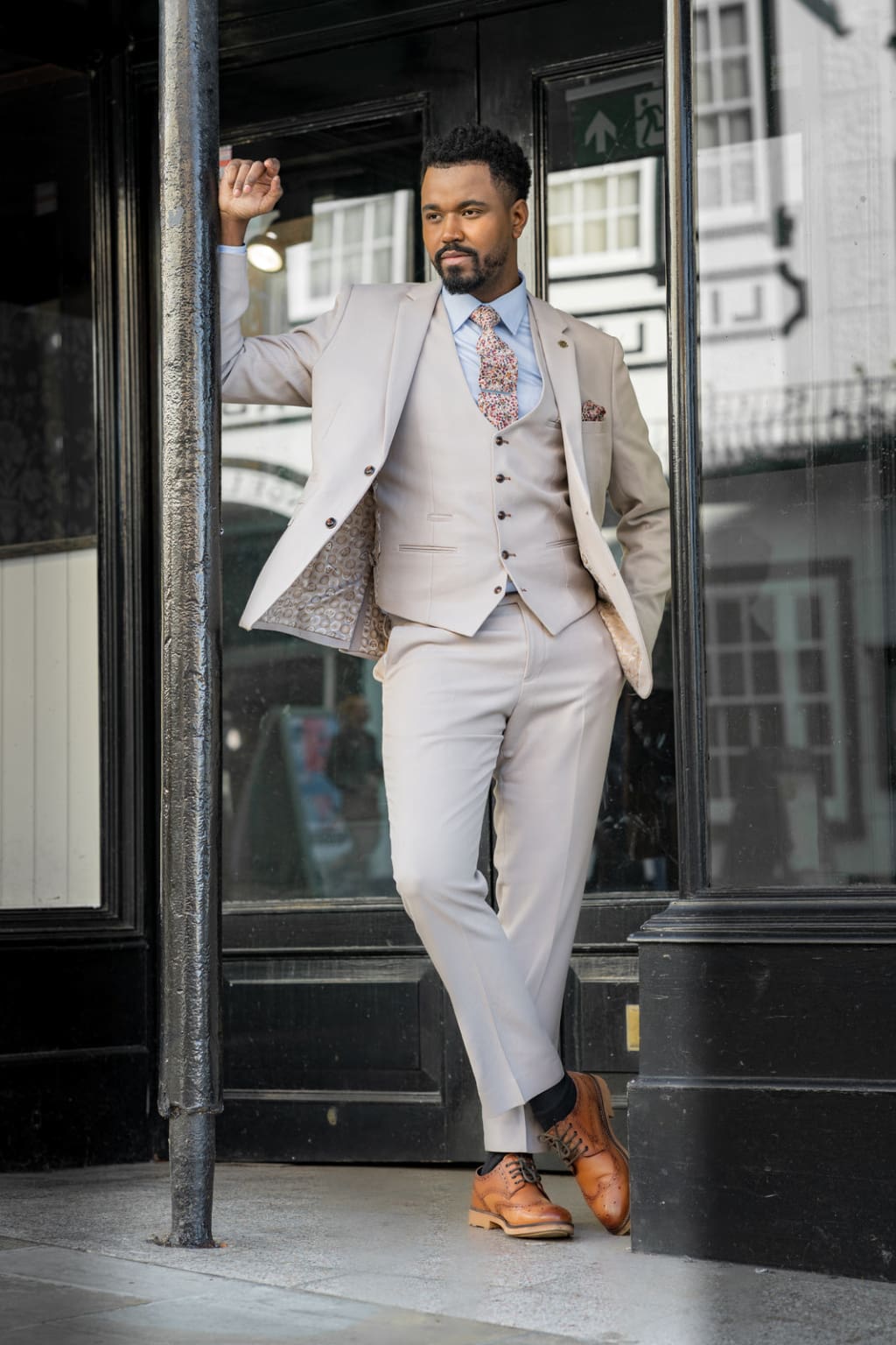 Marc Darcy HM5 Beige Stone Blazer outside a shop on high street